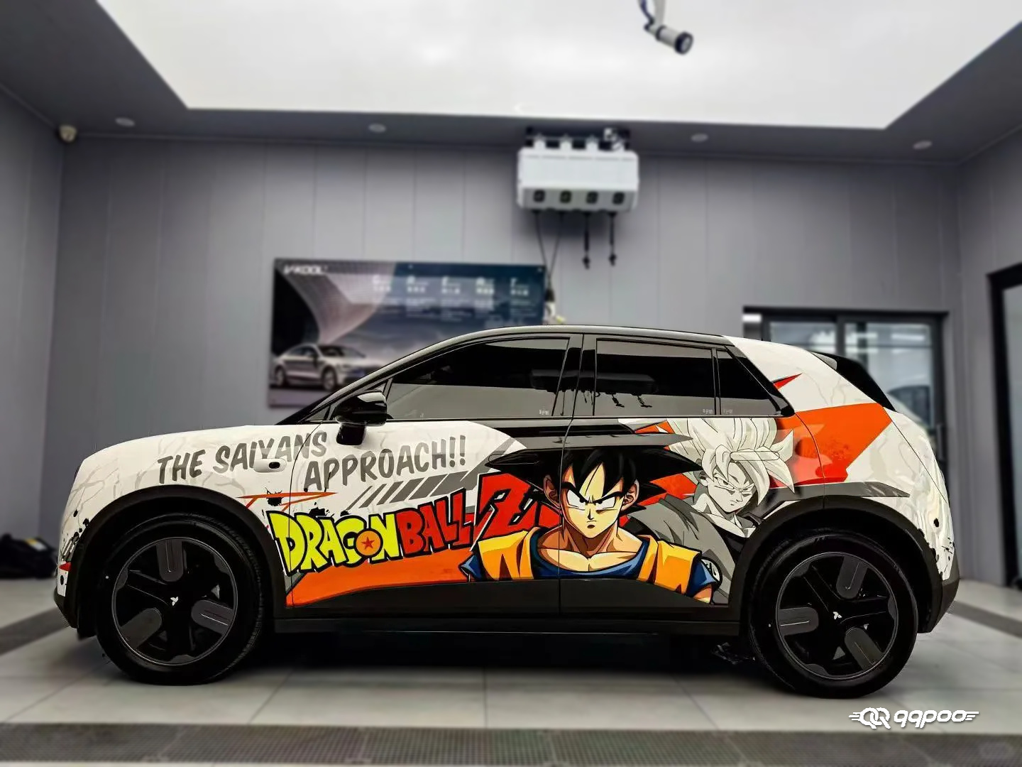 Dragon Ball Z Goku Car Wrap AW-191 on a white SUV with orange, black and white character graphics
